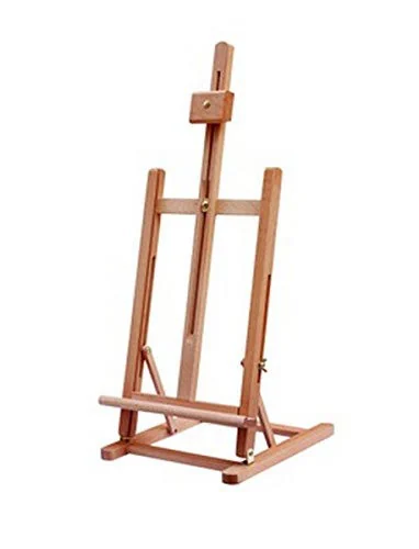 Wooden studio easel with an adjustable canvas support