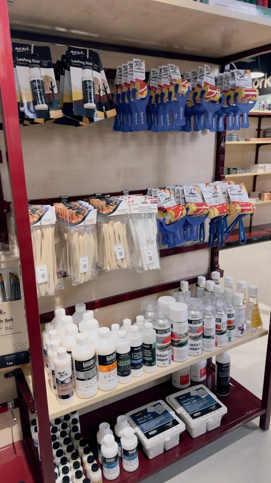 Brushes and mediums on the shelves at Charco